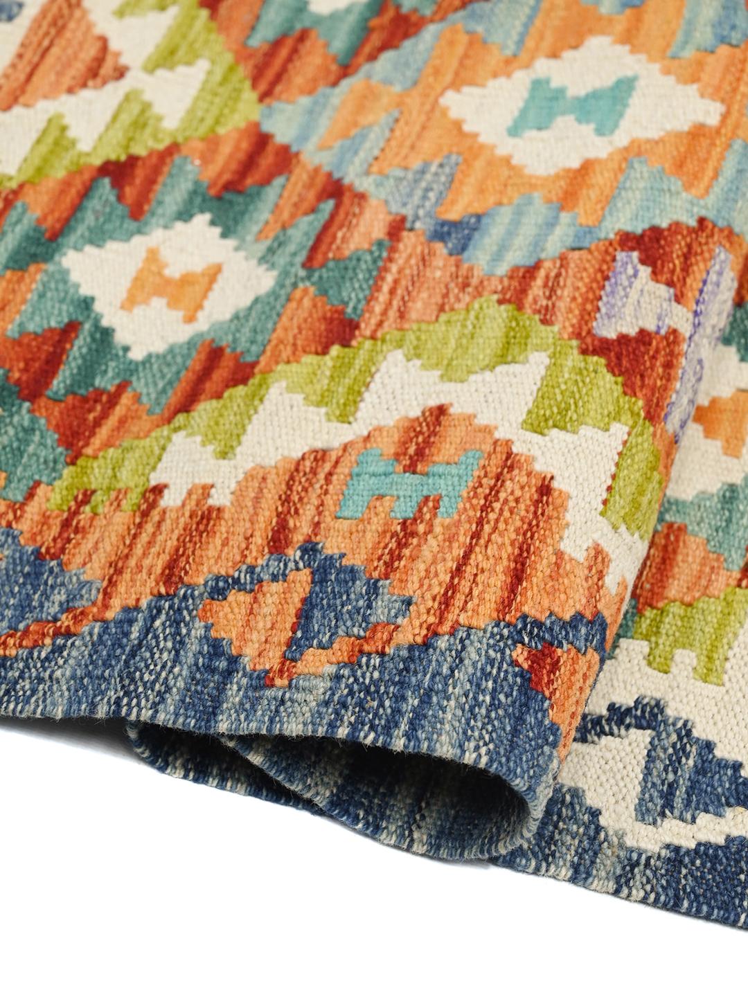 Hand-woven Afghan runner with a vibrant multicolor geometric pattern