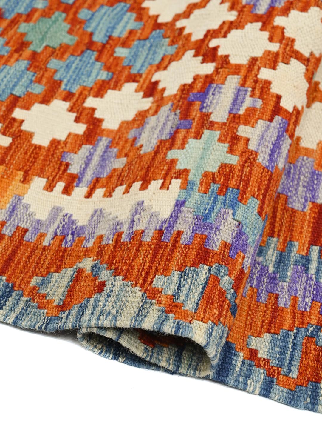 Hand-woven Afghan runner with colourful geometric patterns in multicolour wool