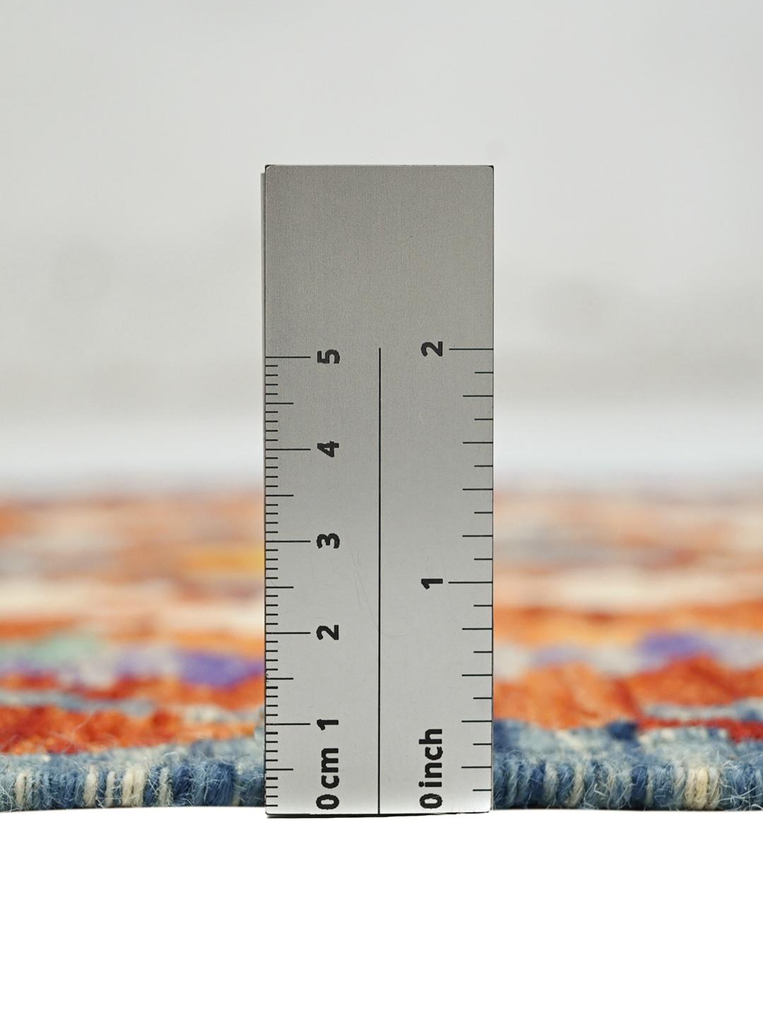 Hand-woven Afghan runner with colourful geometric patterns in multicolour wool