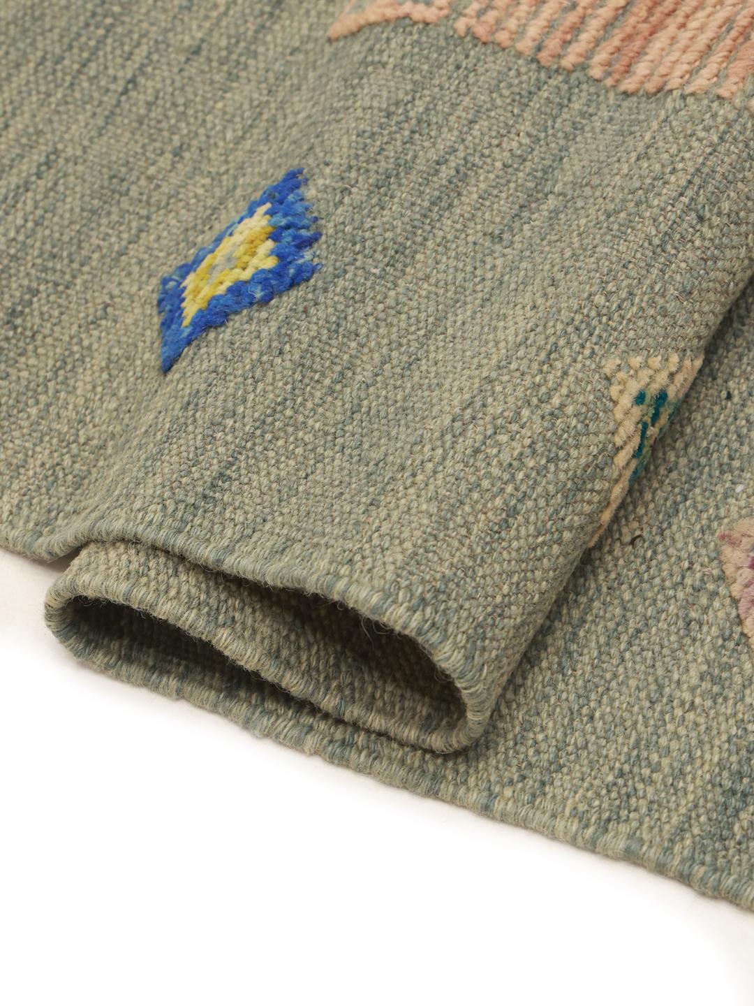 Hand-woven Afghan Kilim rug with a blue-green field and colourful diamond motifs