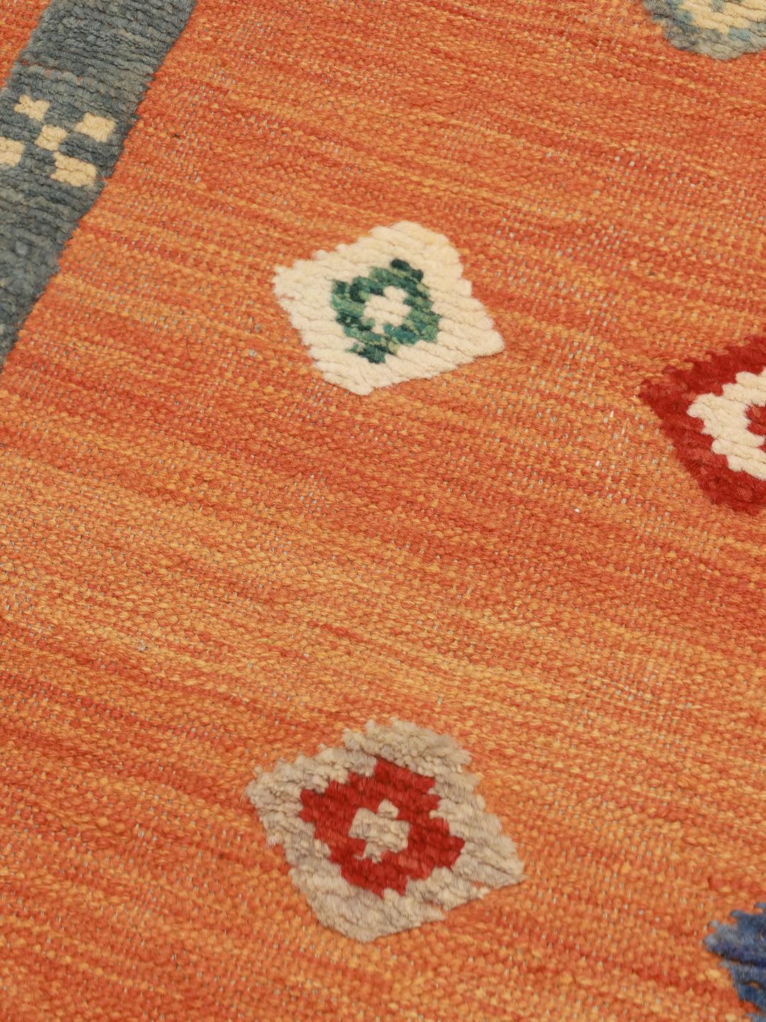 Hand-woven Afghan Kelim Nimbaft rug with an orange field and geometric motifs