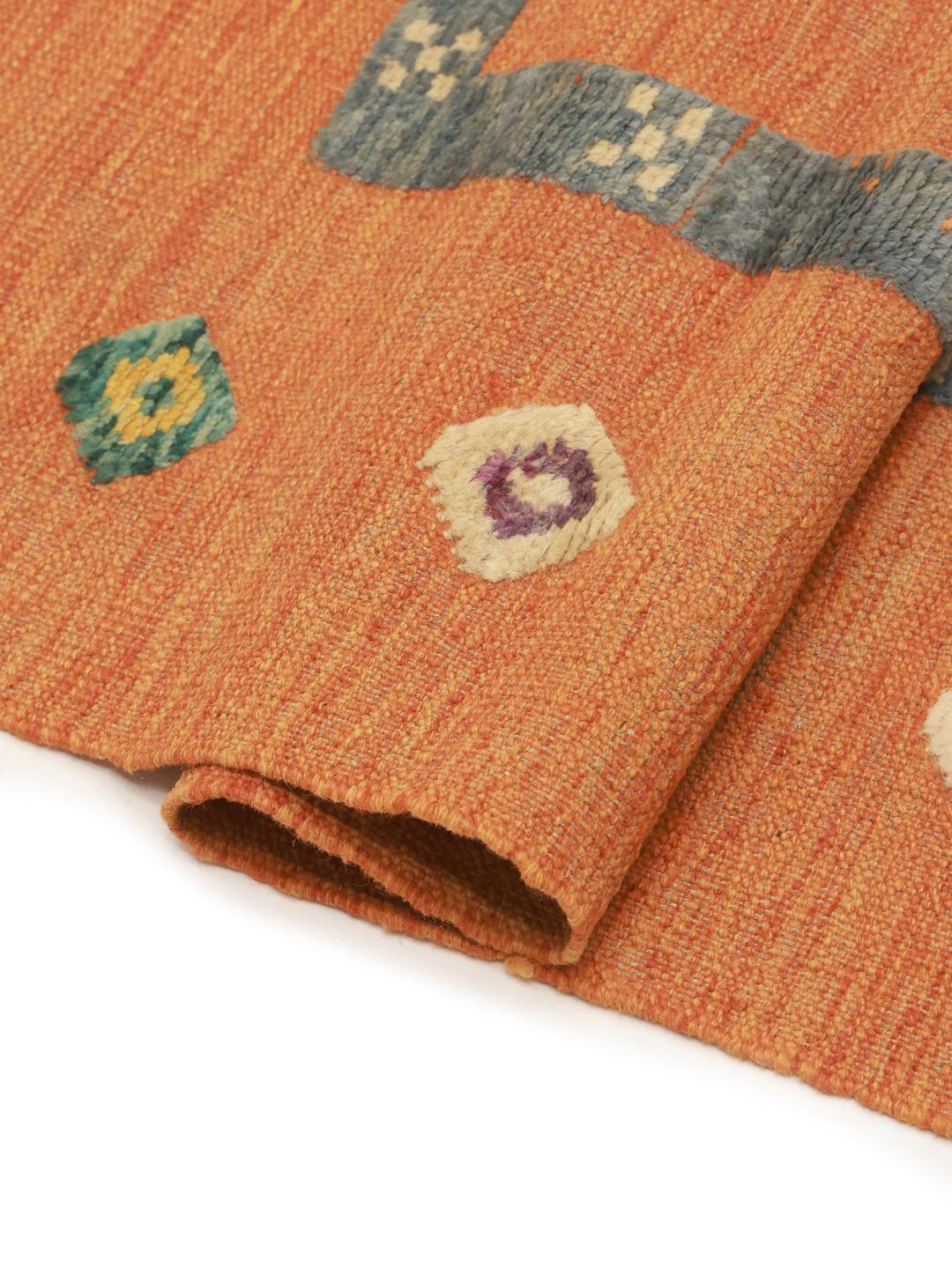 Hand-woven Afghan Kelim Nimbaft rug with an orange field and geometric motifs