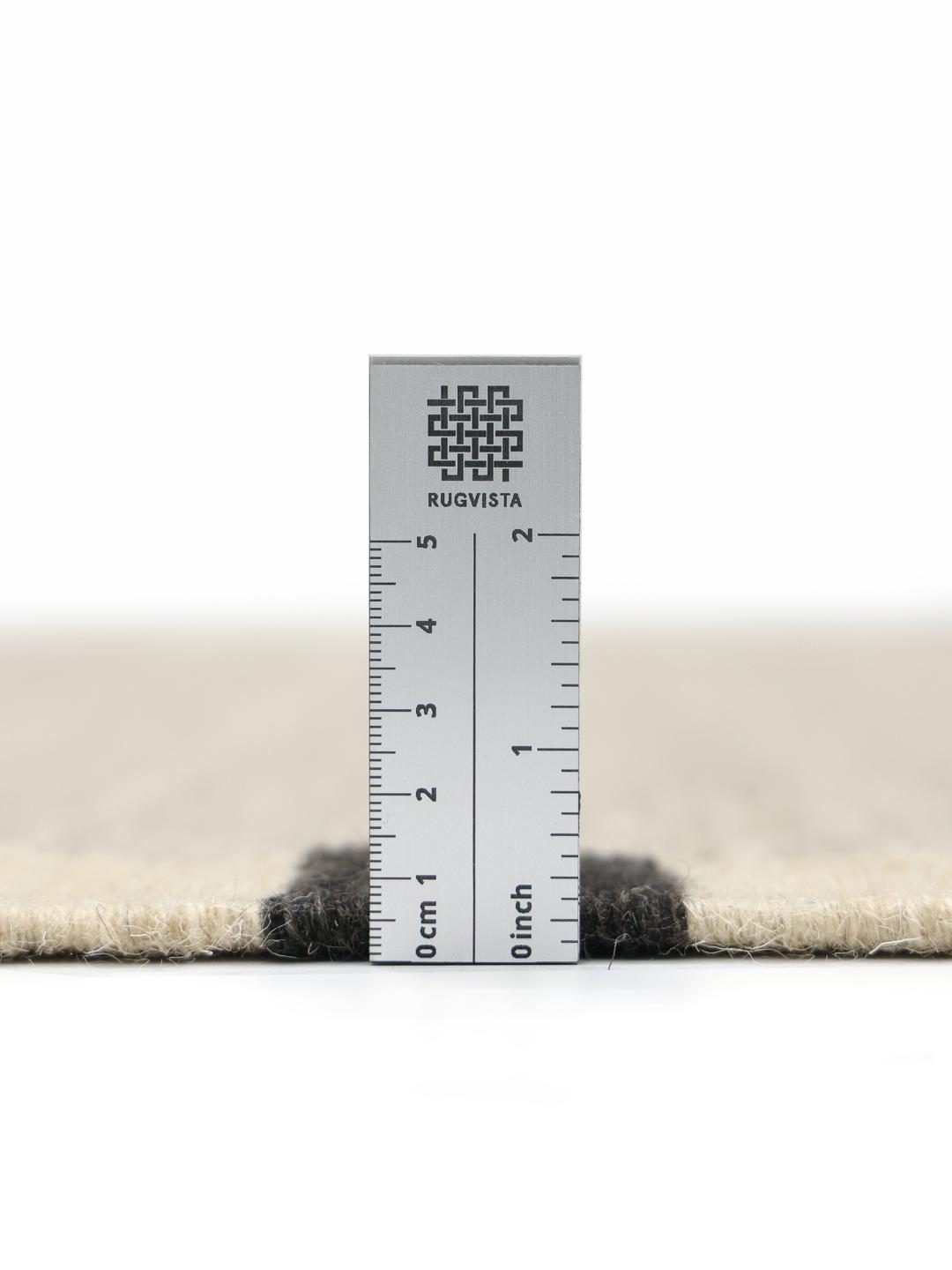Beige tapijt met een donkere rand