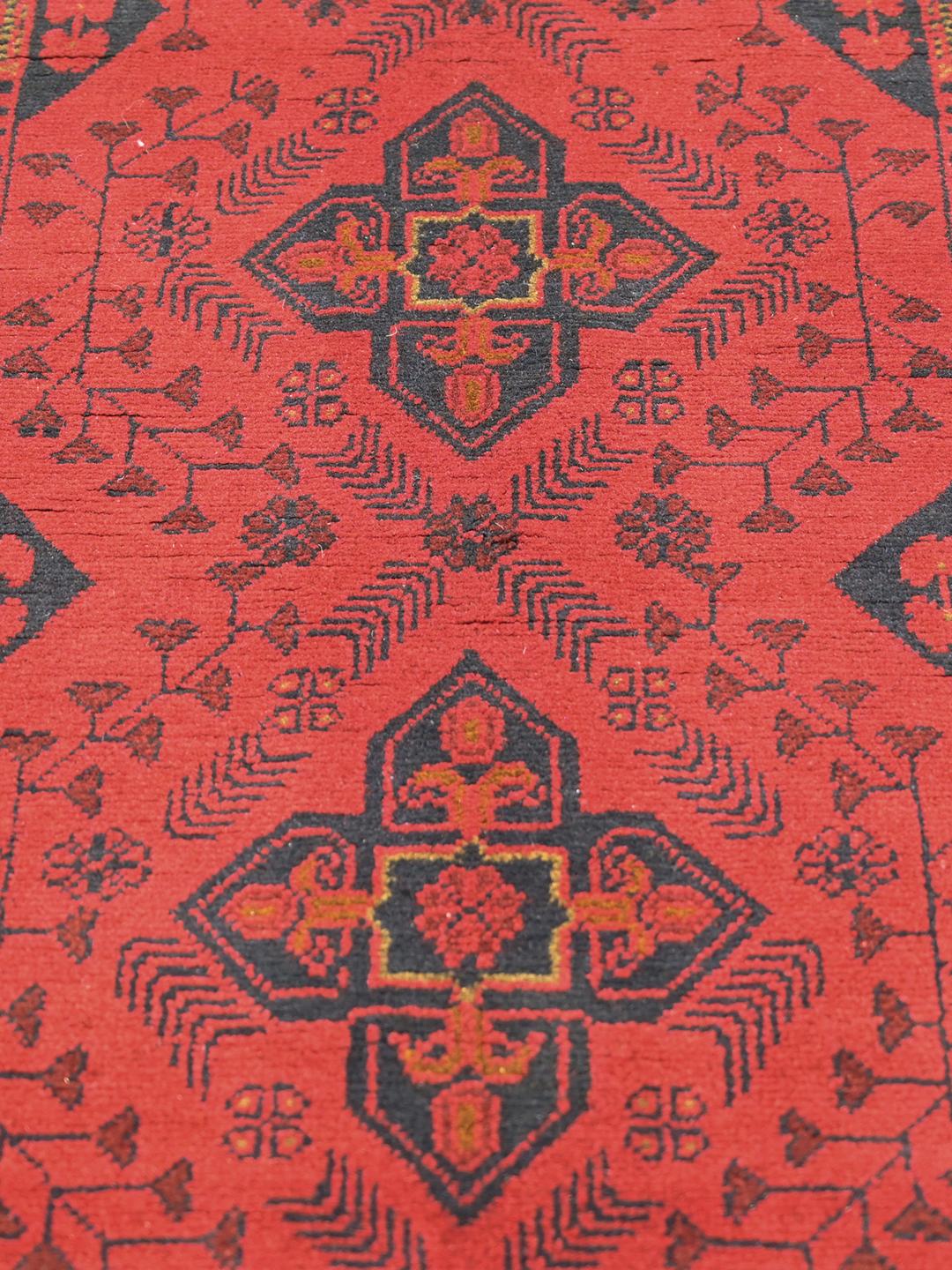 Hand-knotted Afghan Khal Mohammadi wool runner rug in red and black