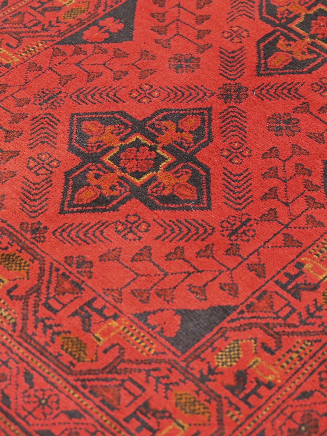 Hand-knotted Afghan Khal Mohammadi wool runner rug in red and black
