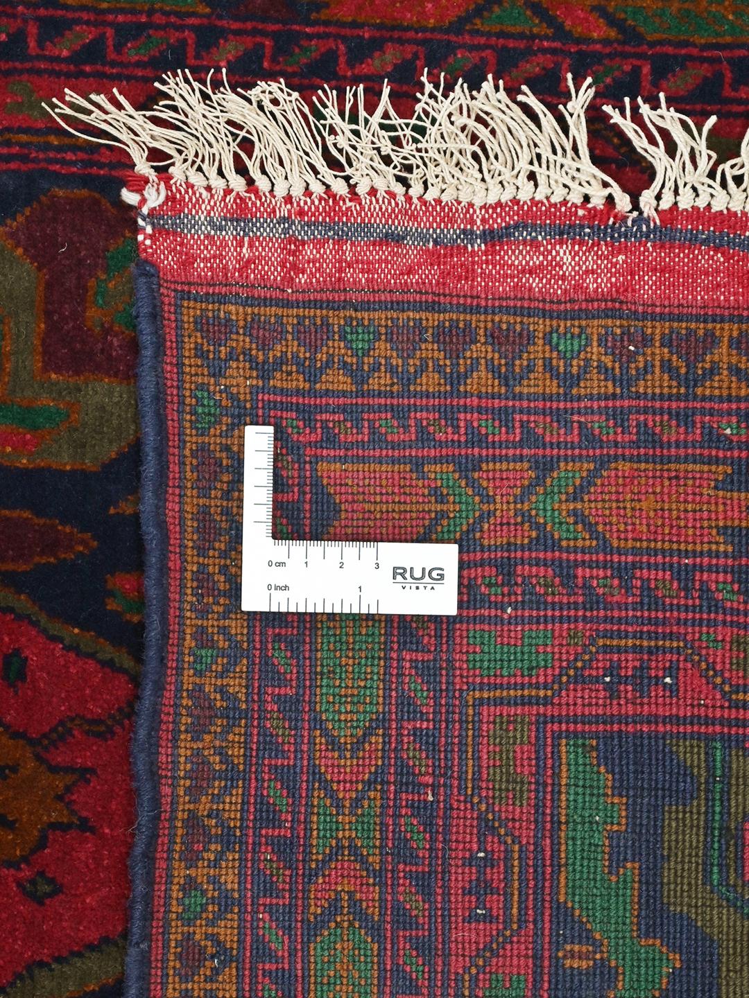 Hand-knotted Afghan runner rug in red and dark-blue wool