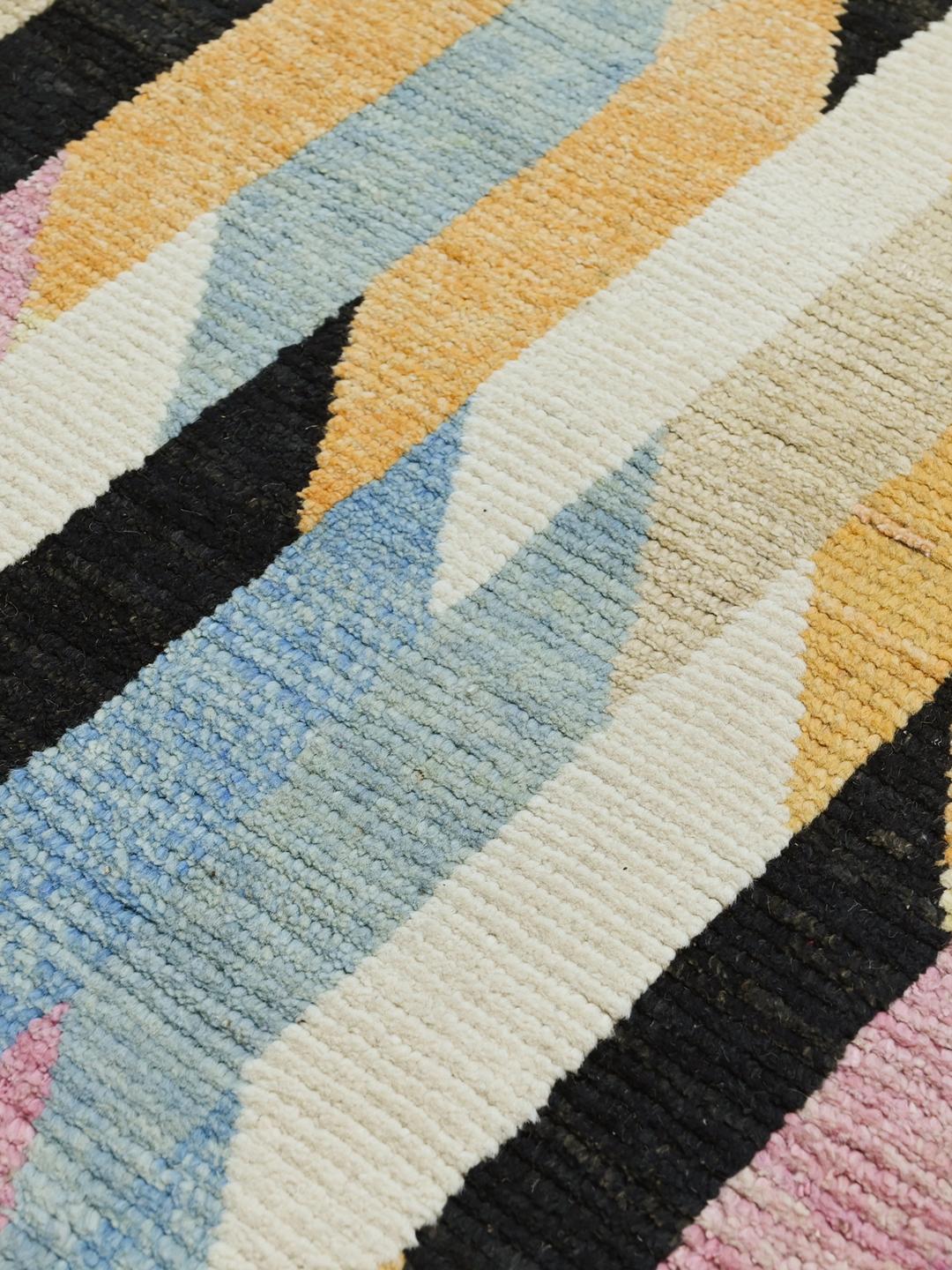 Hand-knotted multicolor wool runner rug from Afghanistan with geometric patterns