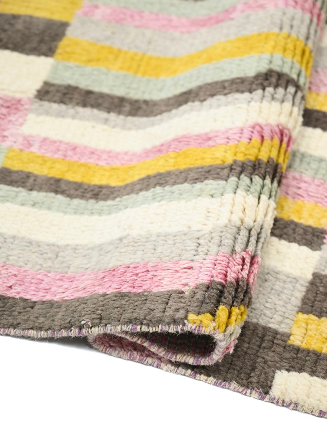 Hand-knotted multicolor wool rug from Afghanistan with vibrant geometric patterns