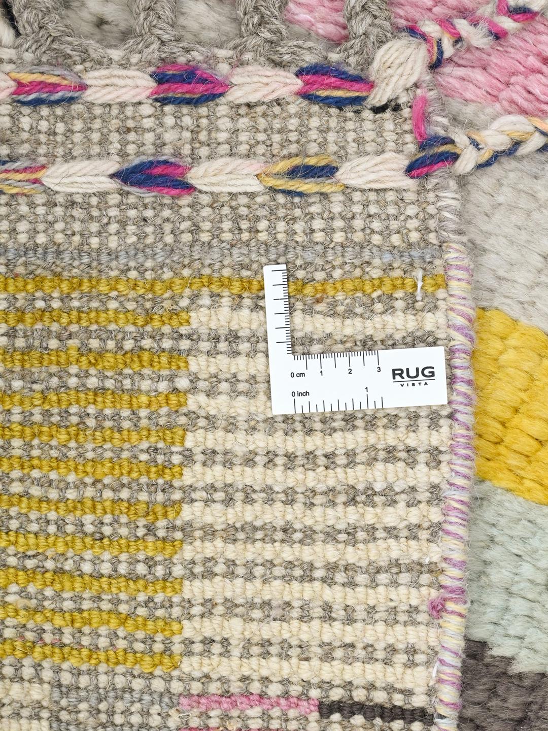 Hand-knotted multicolor wool rug from Afghanistan with vibrant geometric patterns