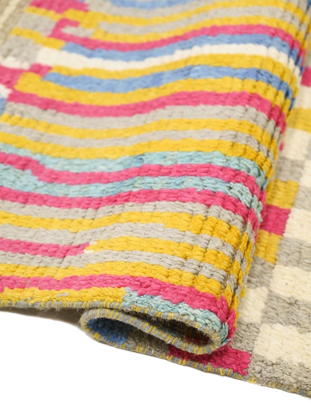 Handgeknoopt multicolor wollen vloerkleed uit Afghanistan met geometrische stammenpatronen