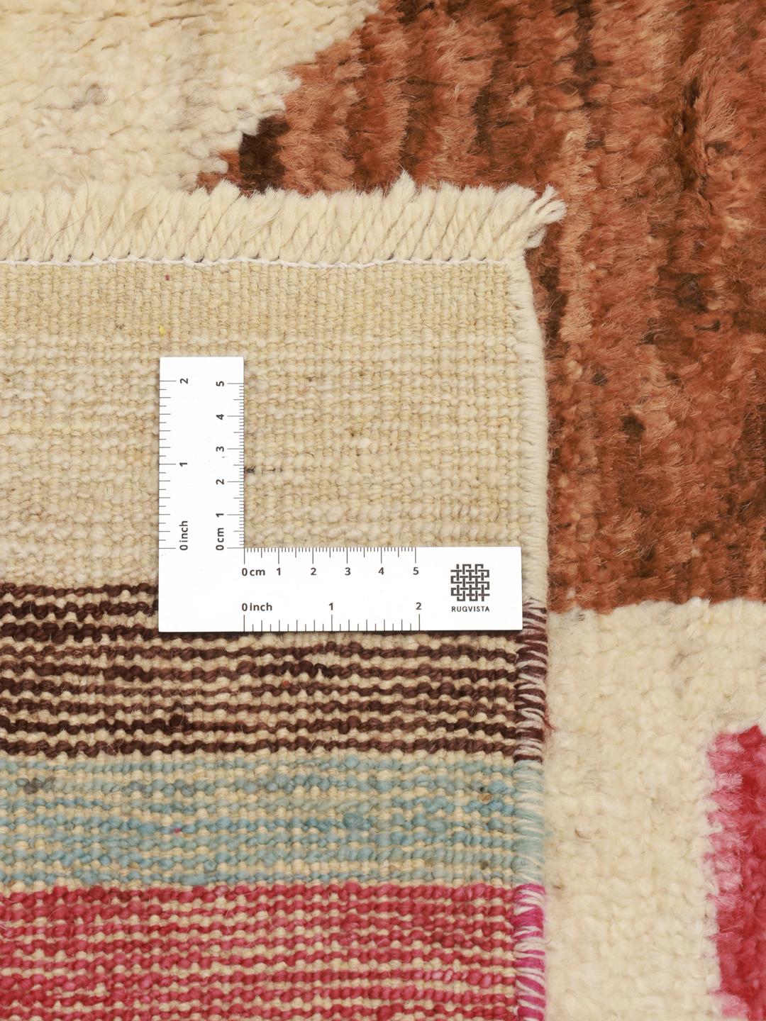 Håndknyttet afghansk tæppe med flerfarvet geometrisk design