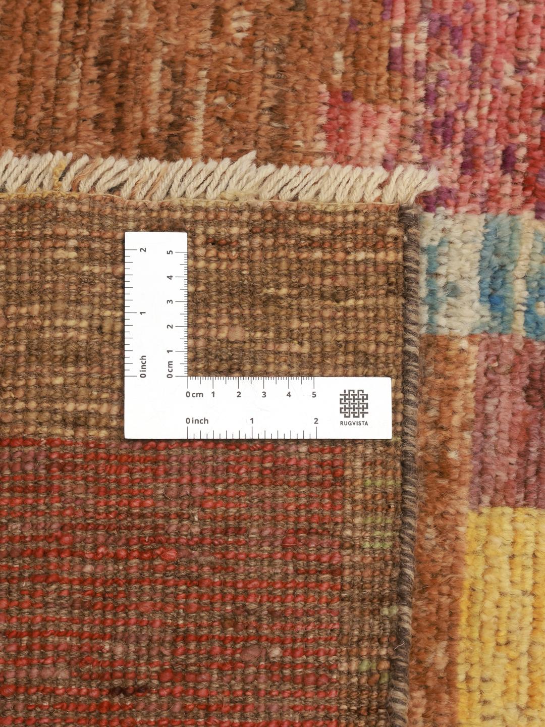 A large, one-of-a-kind multicolour Berber rug from Afghanistan with an abstract geometric pattern.