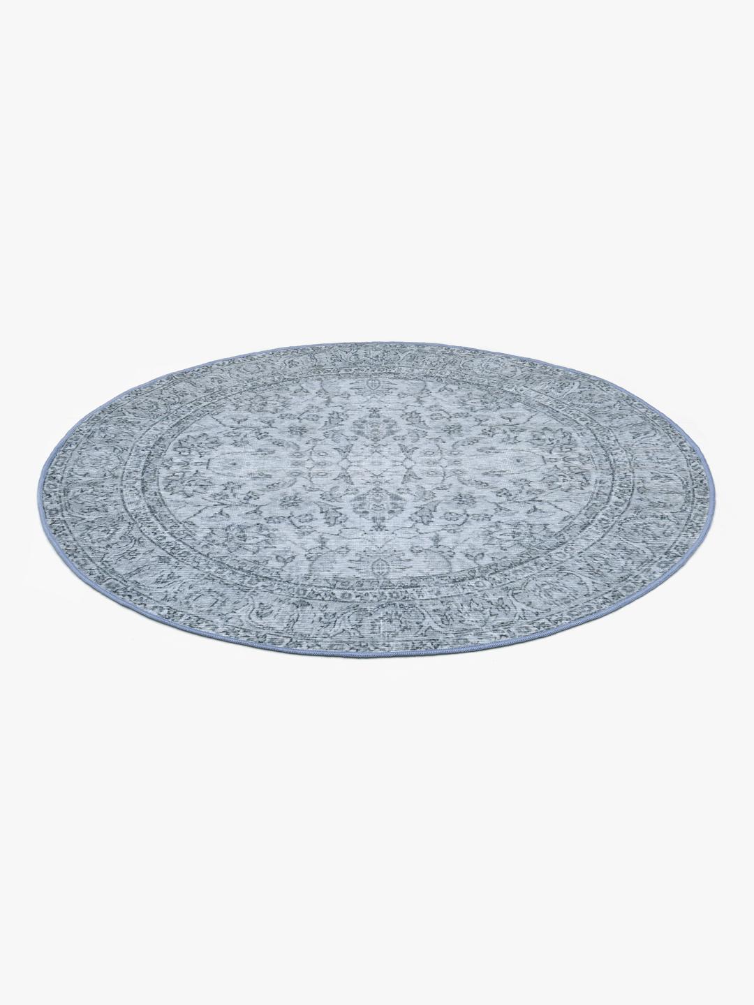 Rond blauw tapijt met medaillonpatroon