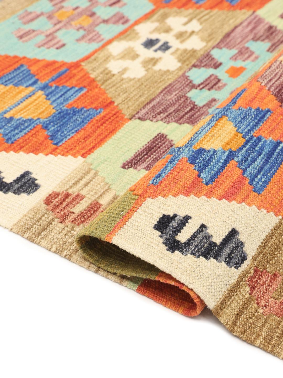 Tapis Kelim afghan tissé à la main avec un motif géométrique vibrant en laine multicolore