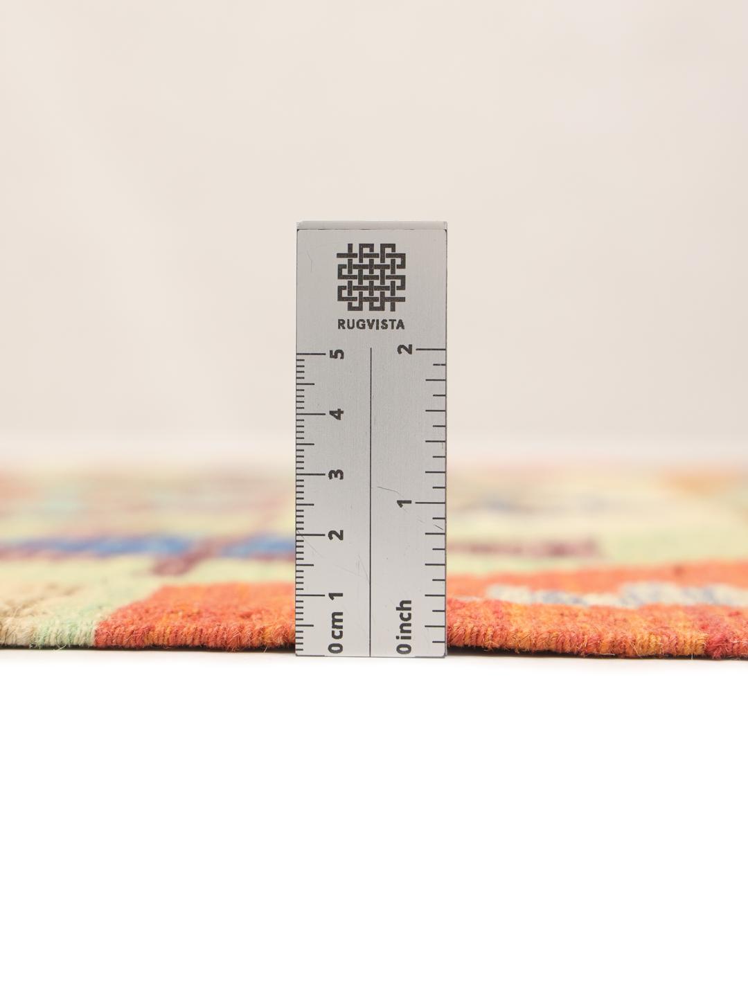 Tapis Kelim afghan tissé à la main avec un motif géométrique vibrant en laine multicolore