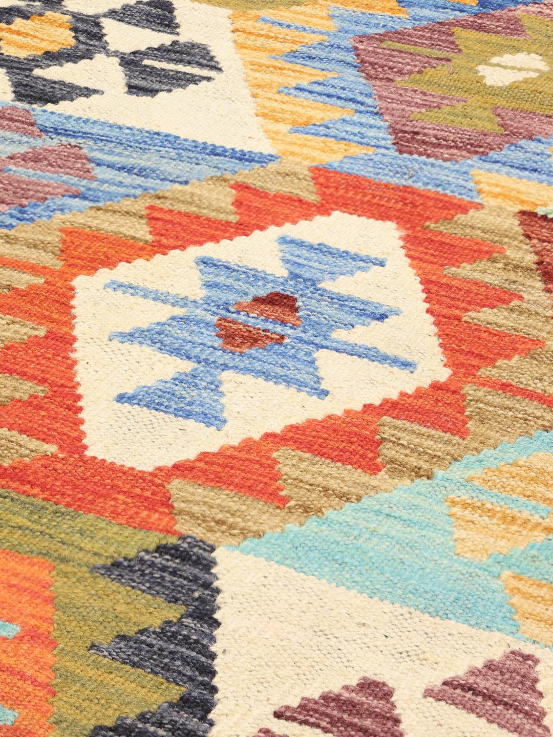Hand-woven Afghan Kelim rug featuring a colourful geometric design on a Wool foundation