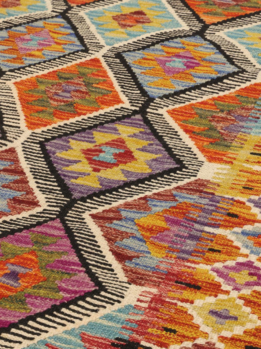 Hand-woven Afghan runner with a vibrant geometric diamond pattern in multicolor Wool
