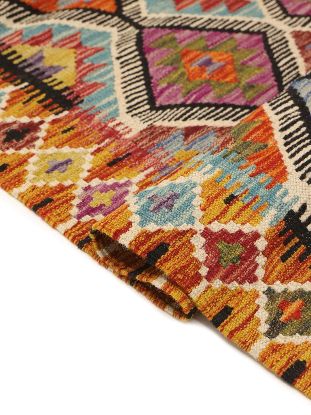 Hand-woven Afghan runner with a vibrant geometric diamond pattern in multicolor Wool