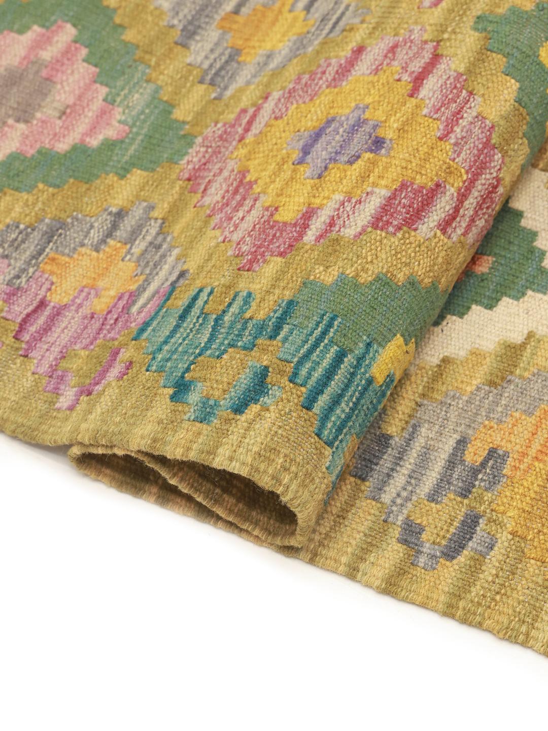 Hand-woven runner with a vibrant multicolor geometric diamond pattern