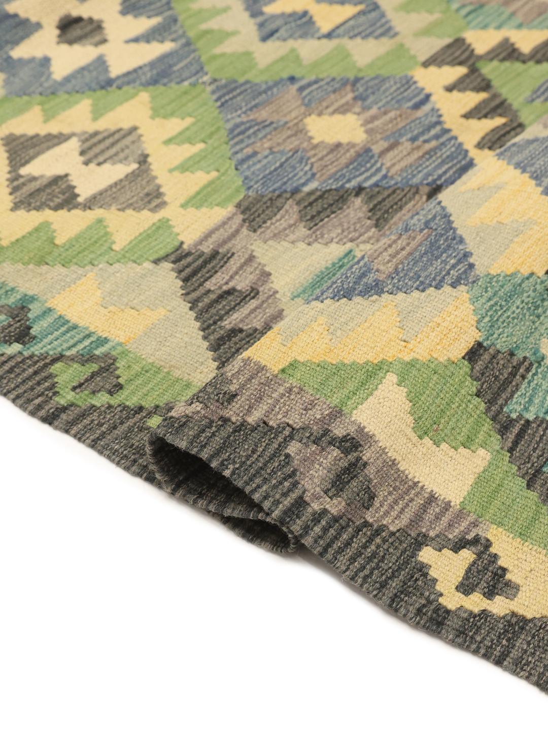 Hand-woven Afghan runner with colourful geometric patterns in Wool