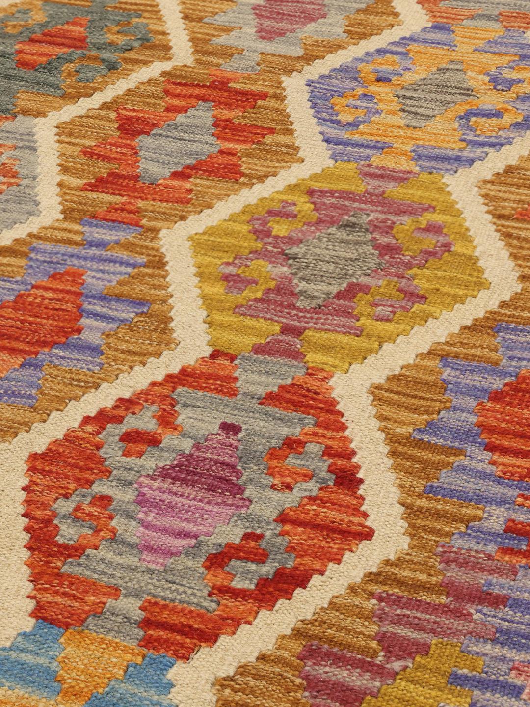Hand-woven Afghan runner with vibrant multicolor diamond patterns