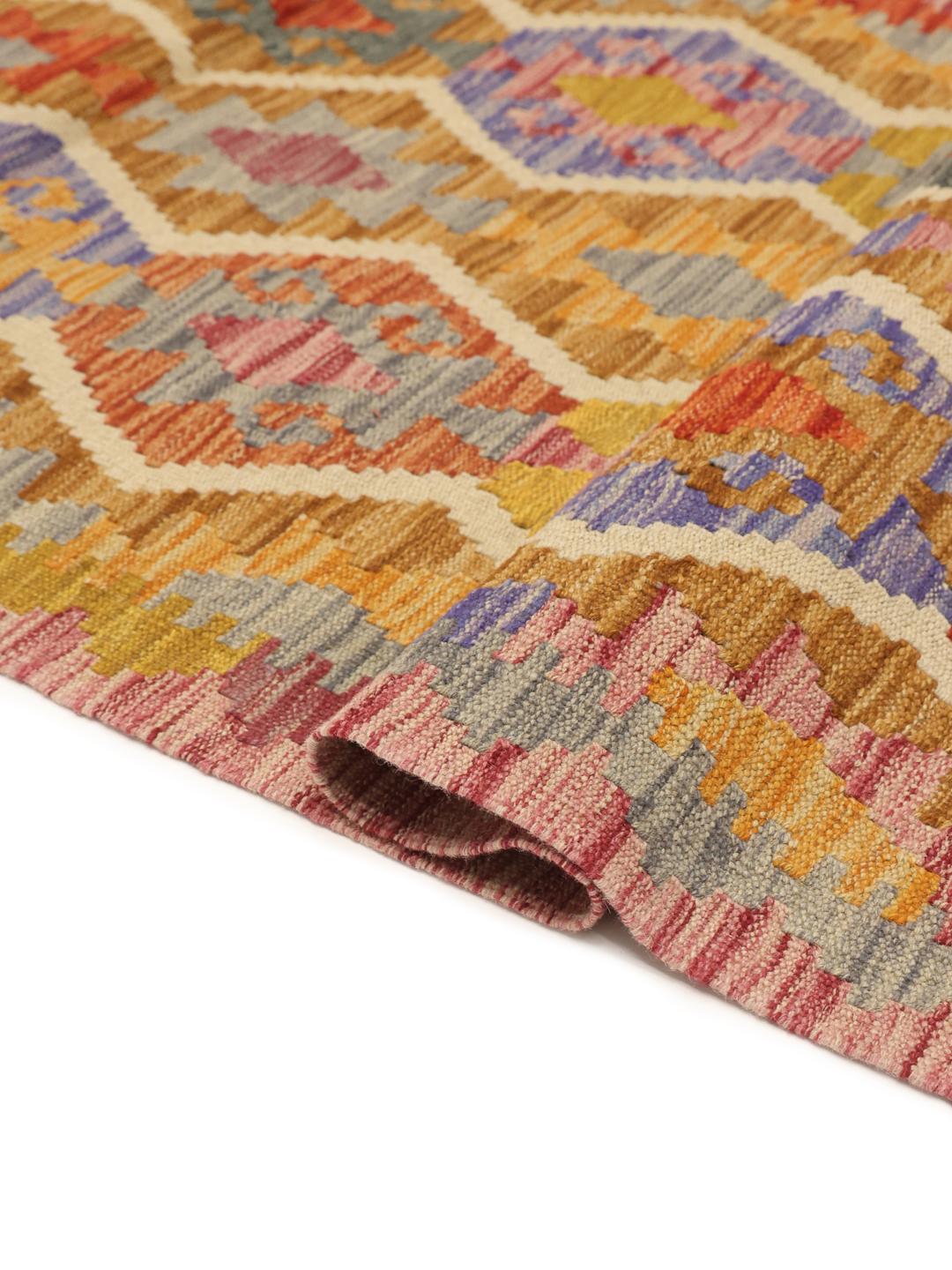 Hand-woven Afghan runner with vibrant multicolor diamond patterns