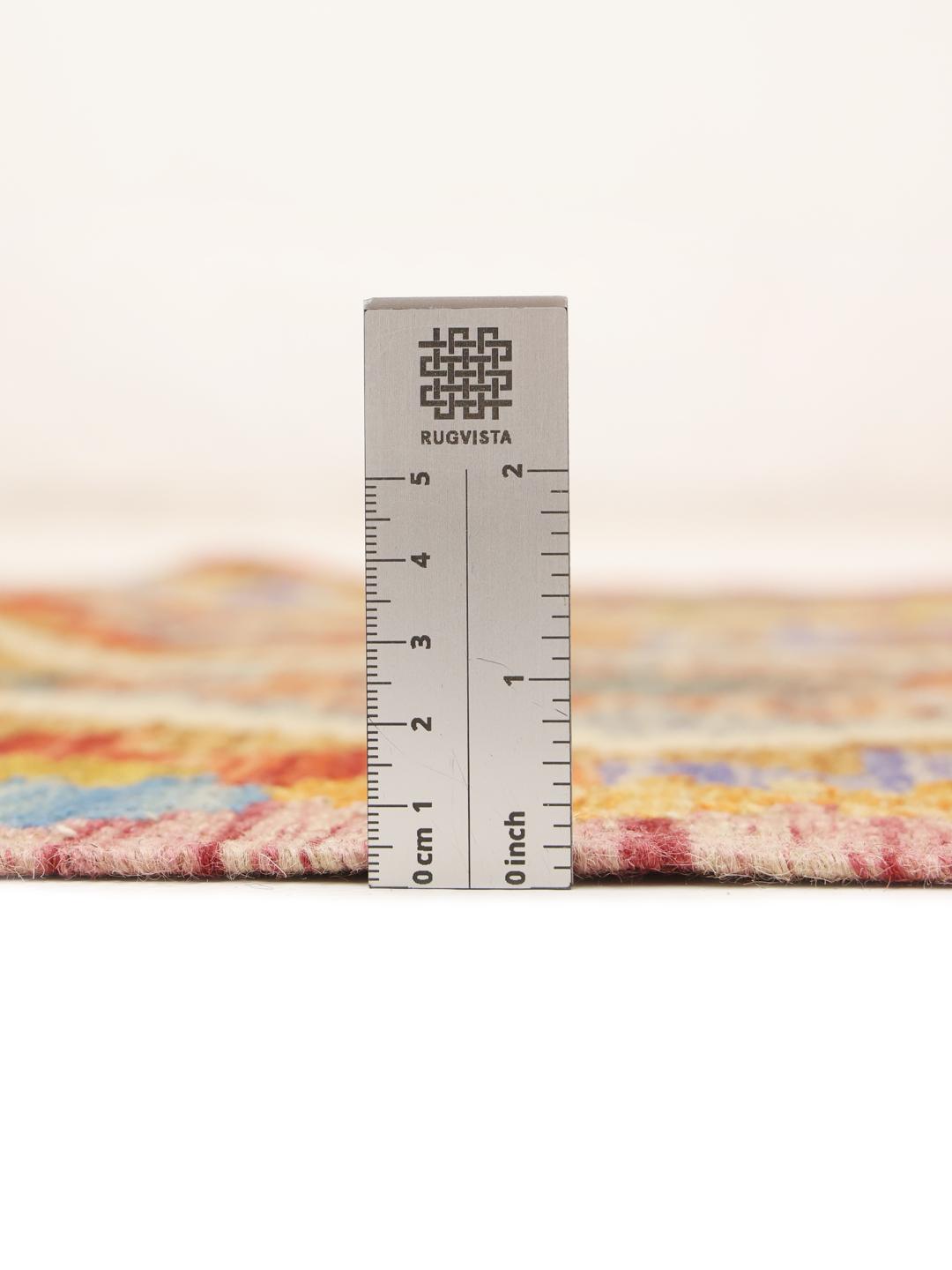 Hand-woven Afghan runner with vibrant multicolor diamond patterns
