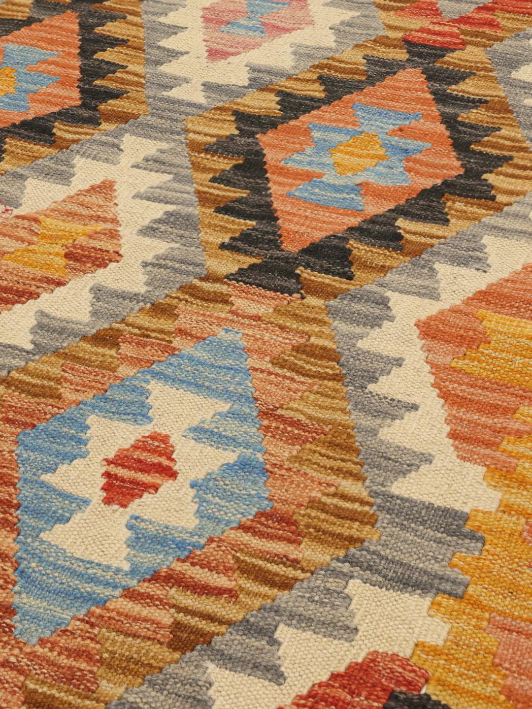 Håndvævet afghansk løber med farverige geometriske mønstre i uld