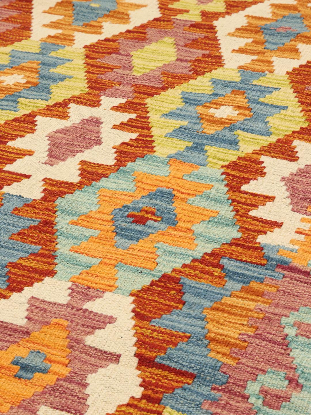 Hand-woven Afghan runner with a geometric pattern in multicolour Wool