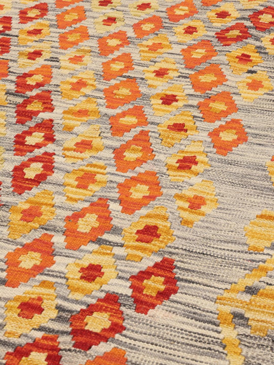 Hand-woven Afghan runner with vibrant geometric patterns in multicolor Wool