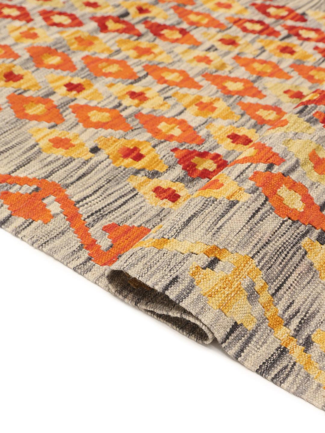 Hand-woven Afghan runner with vibrant geometric patterns in multicolor Wool
