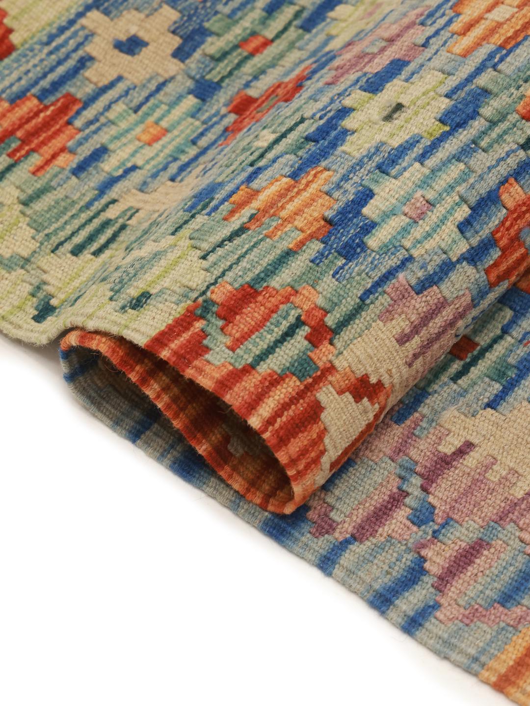 Hand-woven Afghan runner with blue and red geometric motifs