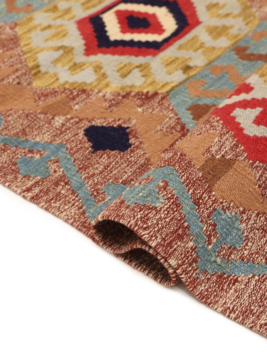 Hand-woven Afghan runner with traditional geometric patterns in multicolour