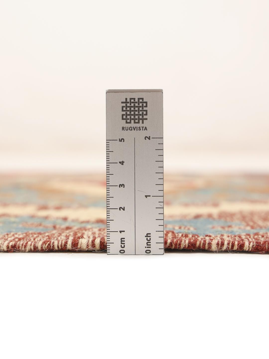 Hand-woven Afghan runner with traditional geometric patterns in multicolour