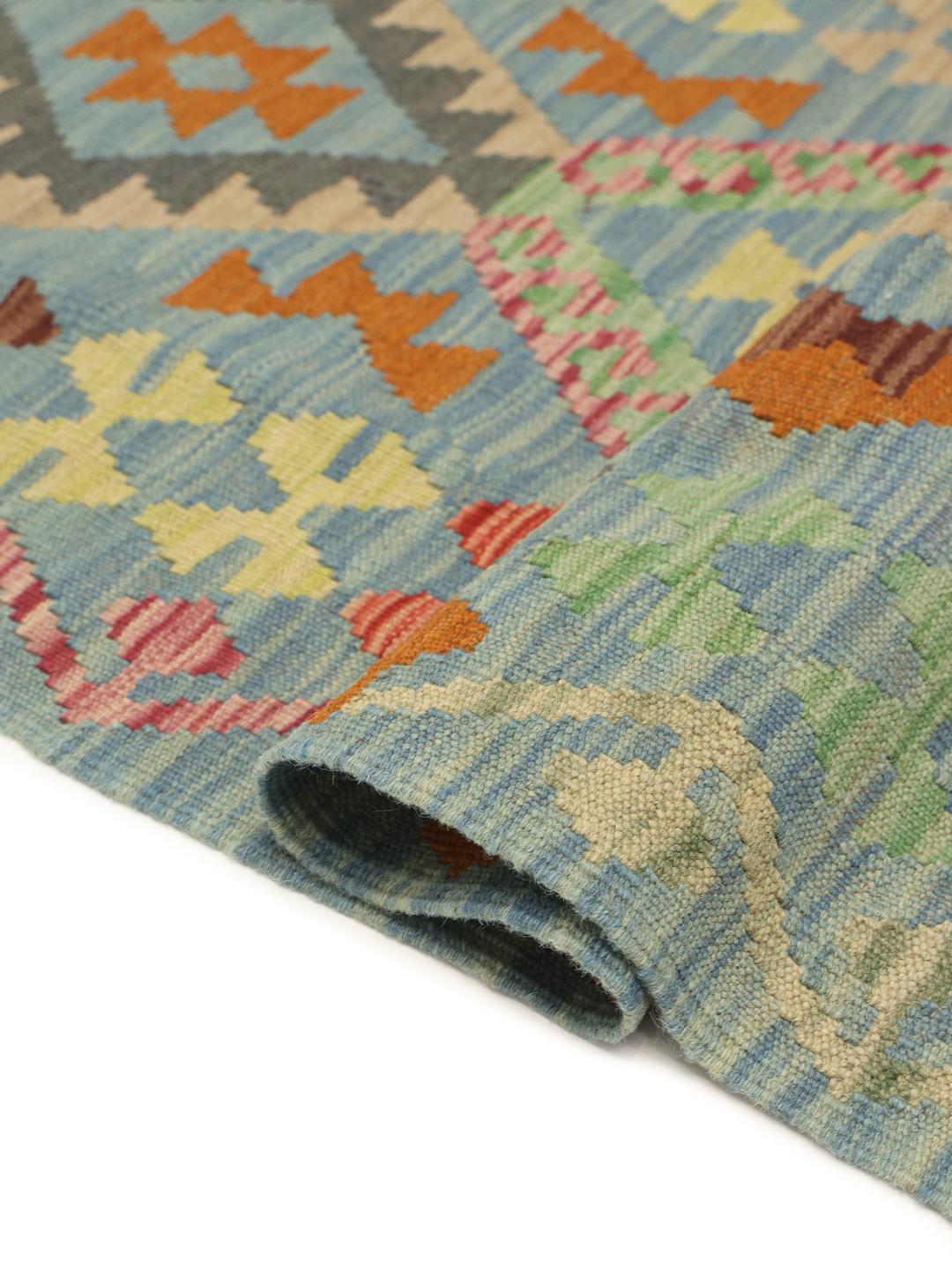 Hand-woven blue Afghan runner with geometric patterns