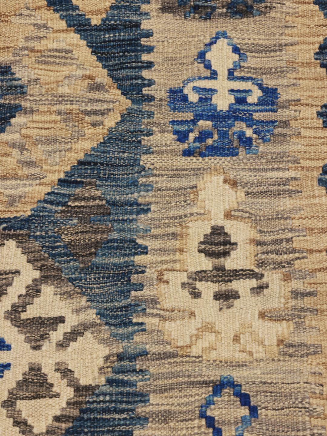 Hand-woven Afghan wool runner with blue and beige geometric patterns