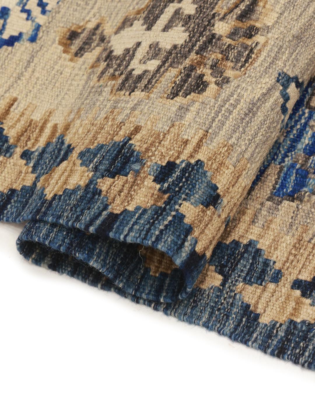 Hand-woven Afghan wool runner with blue and beige geometric patterns