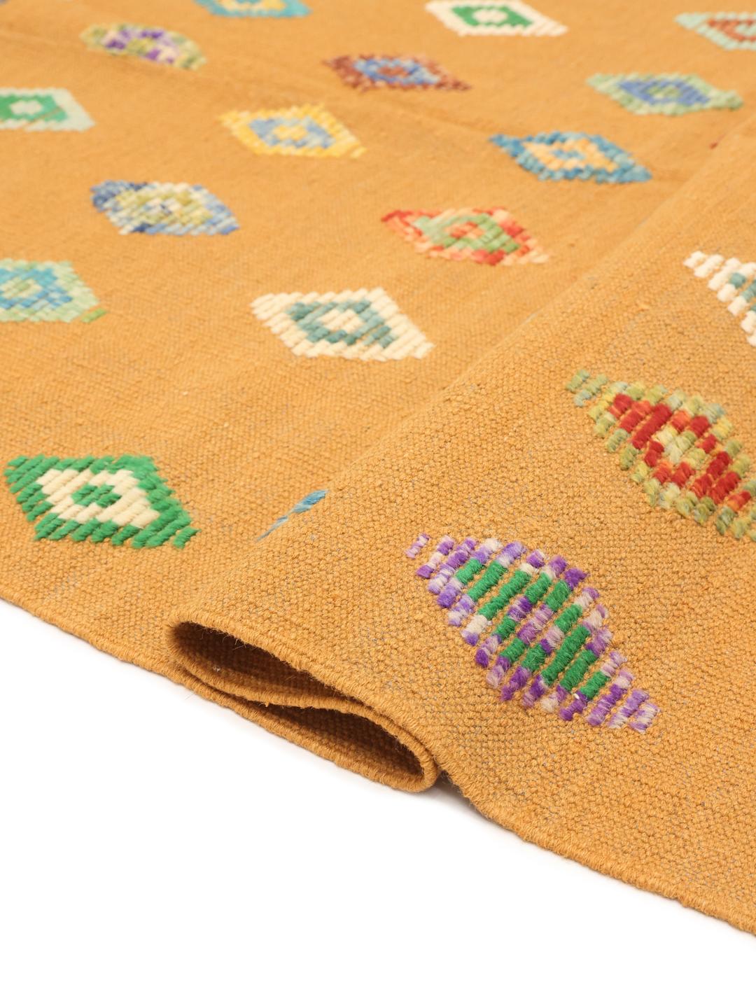 Hand-woven Afghan Kelim Nimbaft rug in mustard with colourful diamond patterns