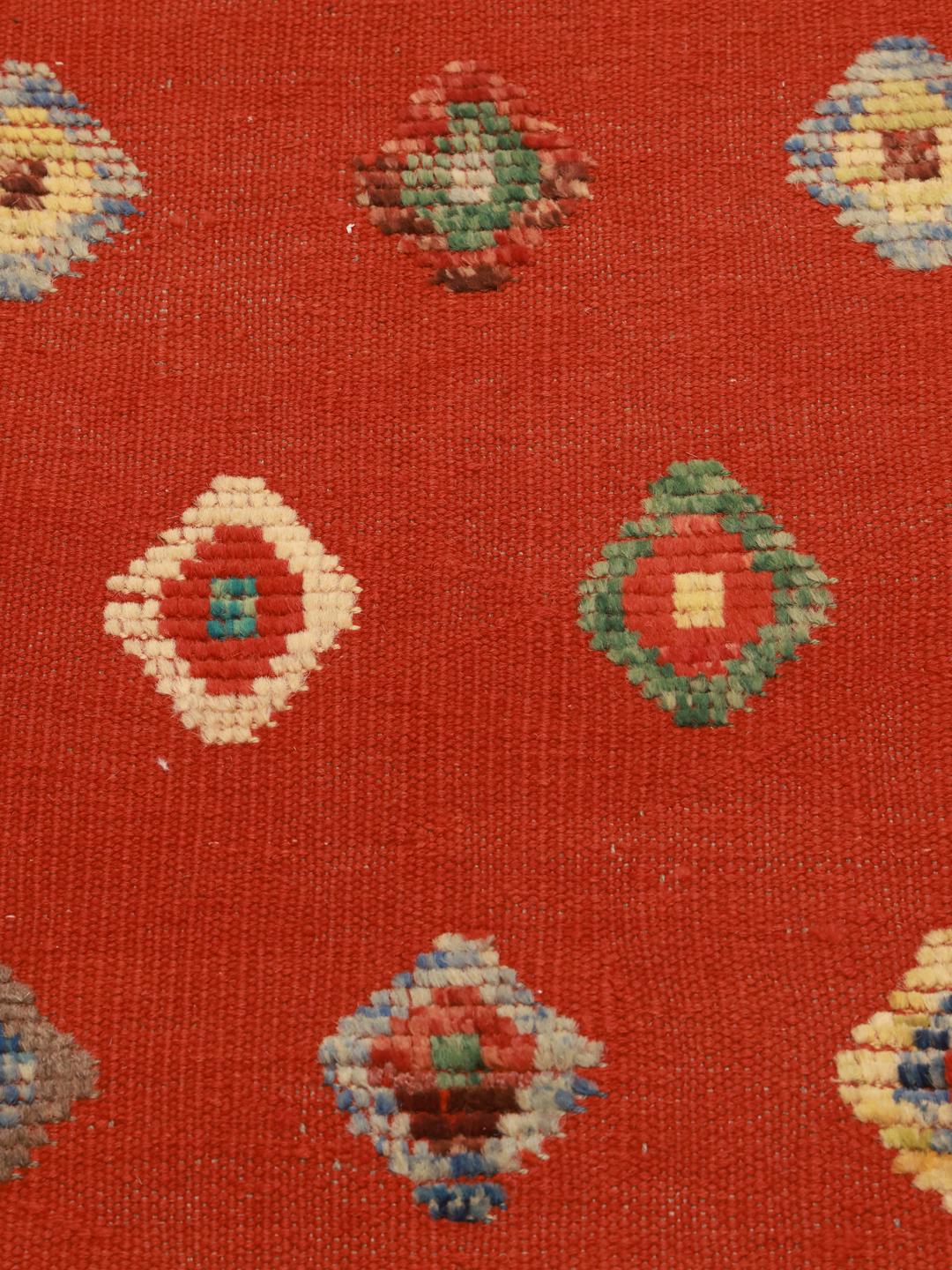 Hand-woven Afghan Kelim Nimbaft rug in red with geometric motifs