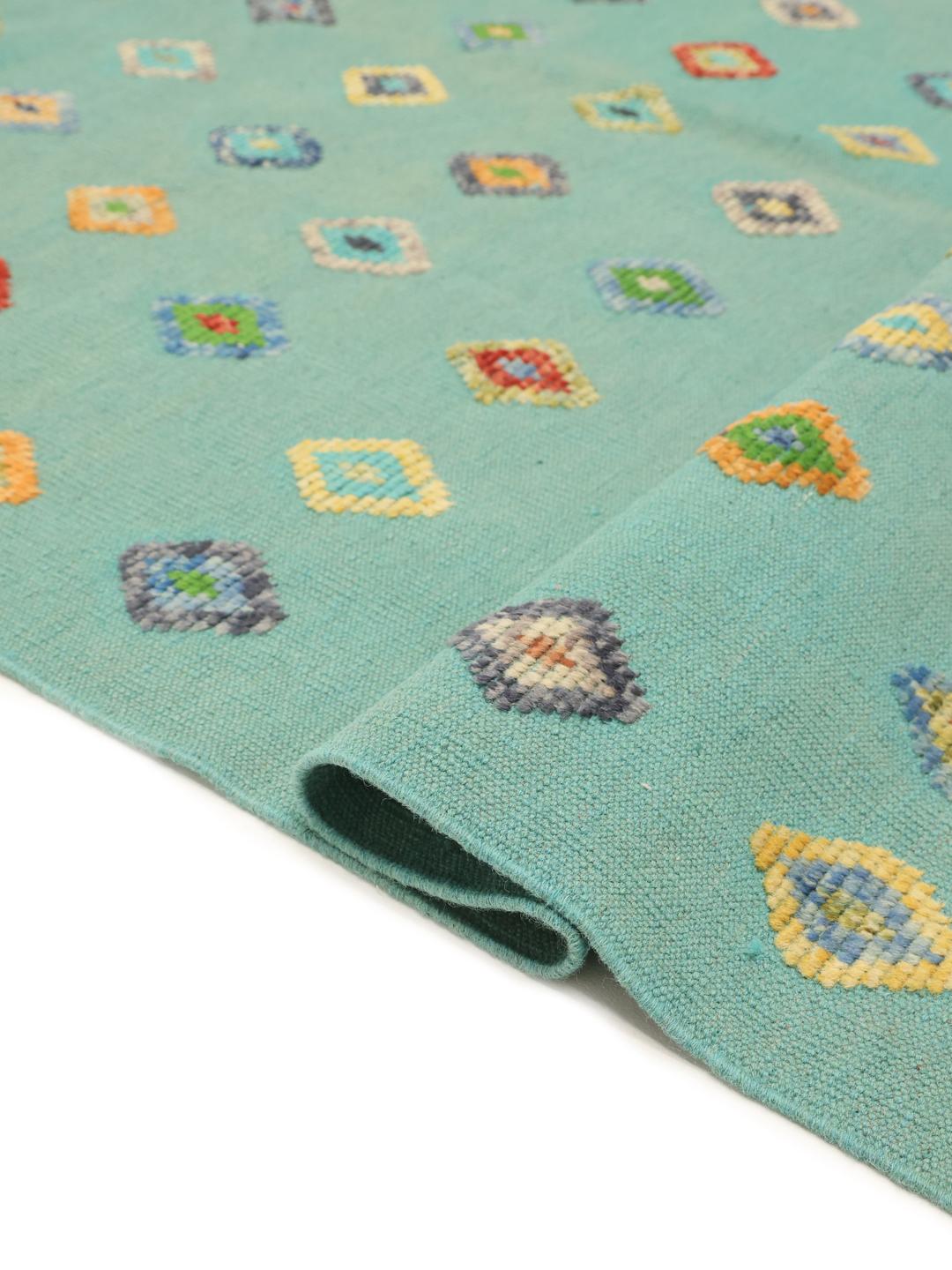 Handgeweven Afghaans Kelim vloerkleed in blauwgroen met een kleurrijk ruitpatroon