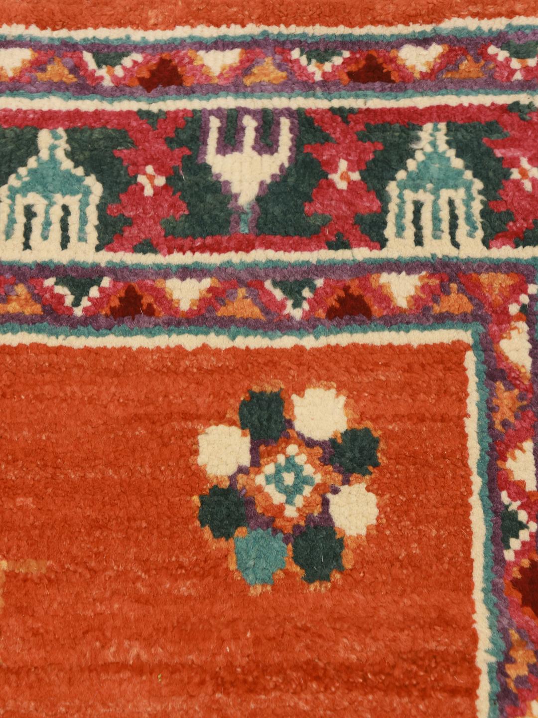 Alfombra Kazak anudada a mano de Afganistán en color naranja vibrante con medallones geométricos