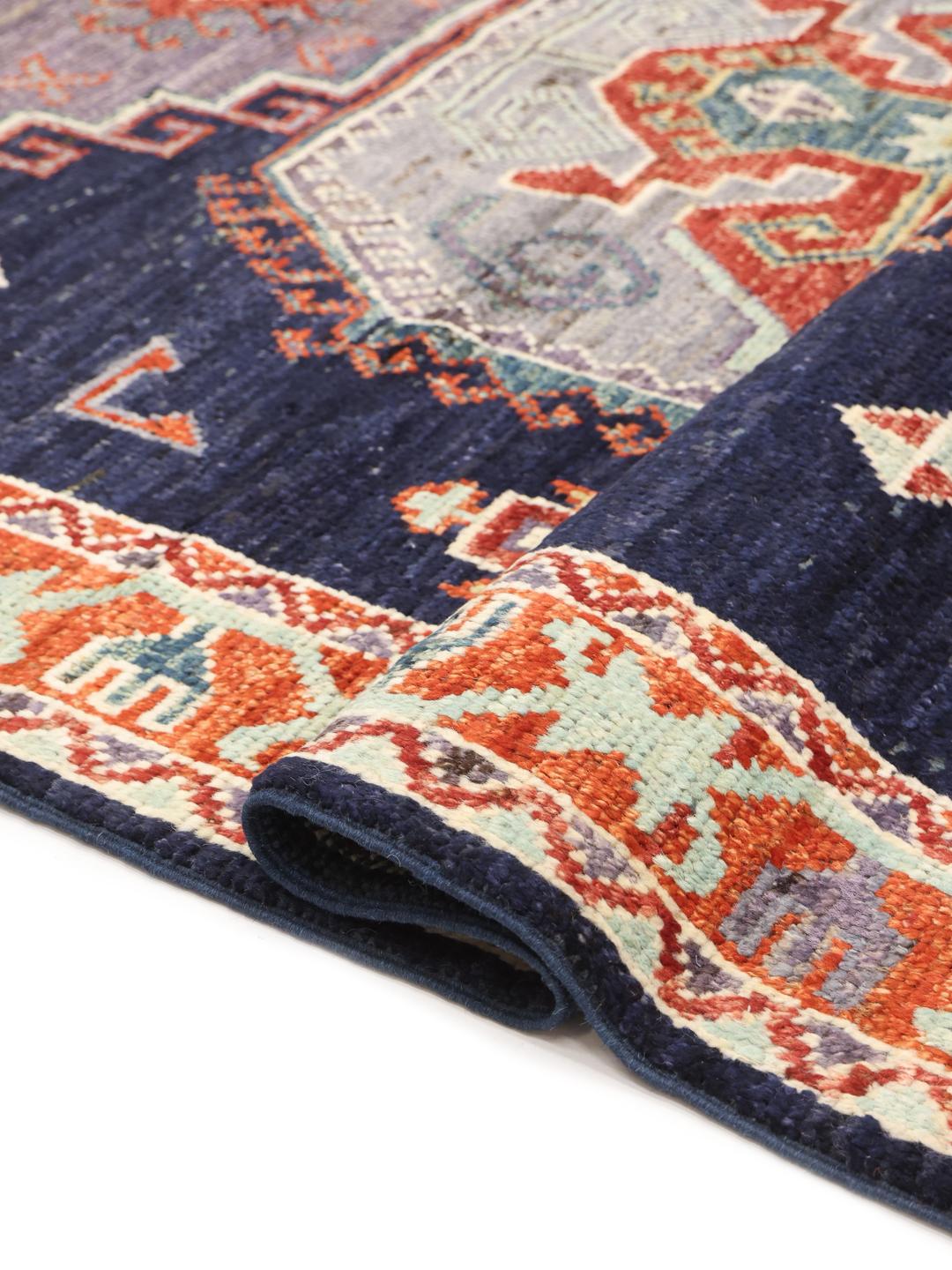Hand-knotted Kazak rug from Afghanistan in dark blue and red tones