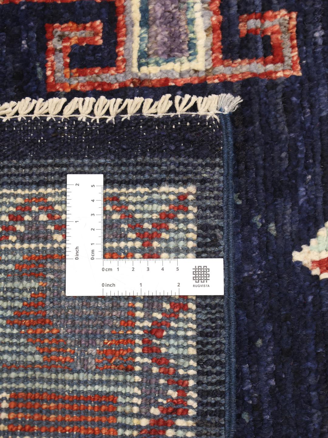 Hand-knotted Kazak rug from Afghanistan in dark blue and red tones
