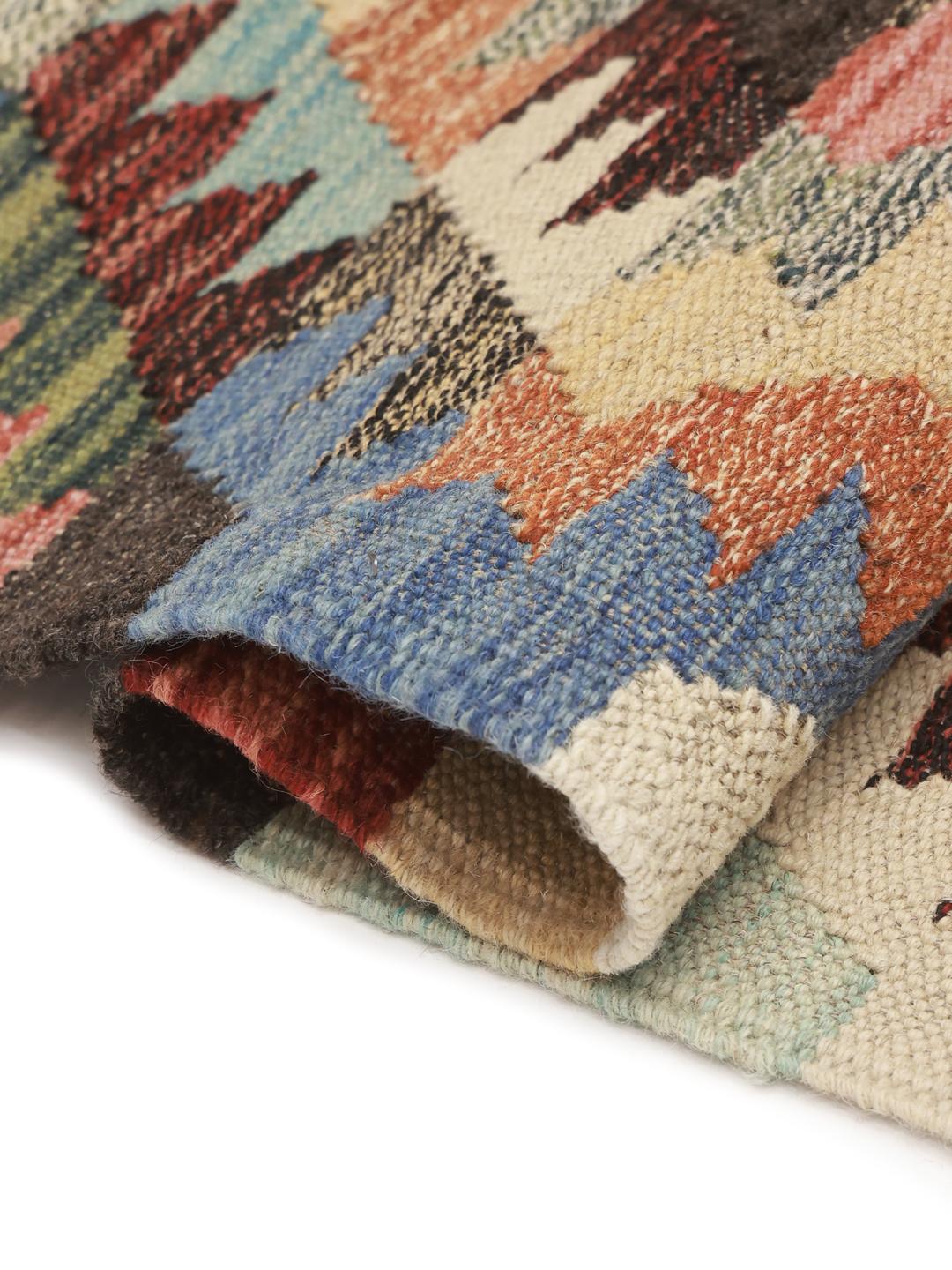 Hand-woven Afghan runner rug with a multicolor geometric pattern