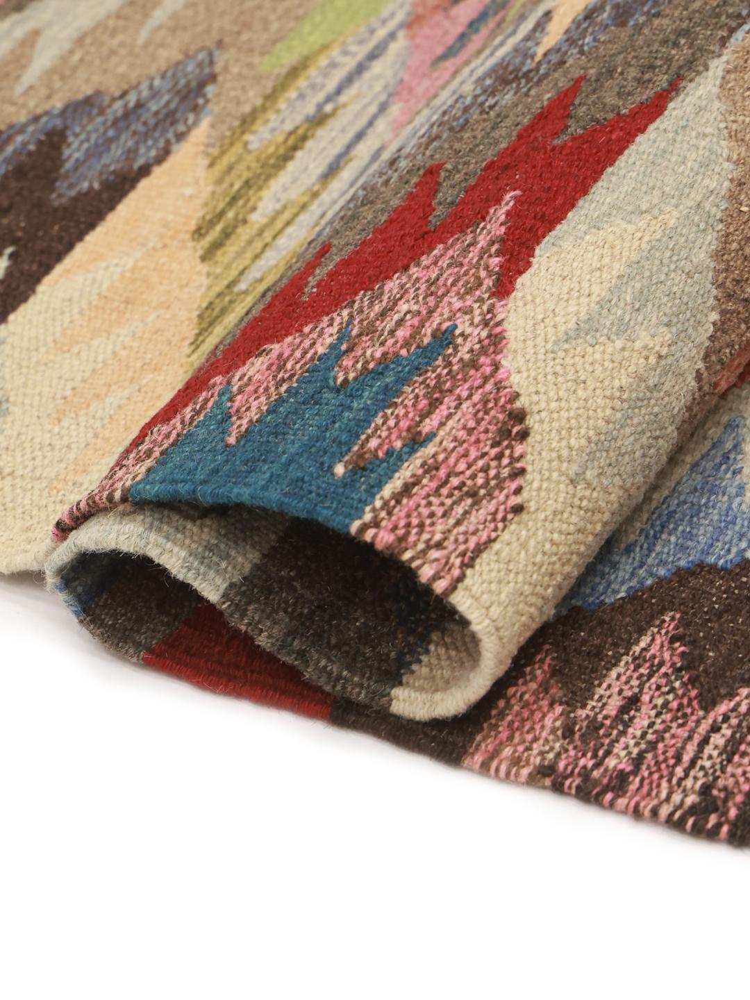 Hand-woven runner with a vibrant multicolored geometric pattern