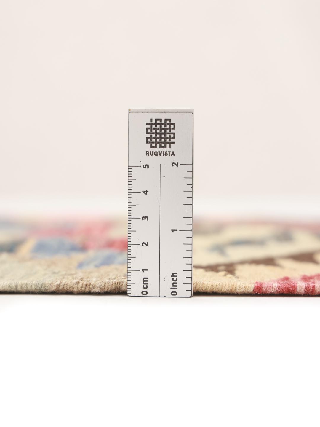 Hand-woven runner with a vibrant multicolored geometric pattern