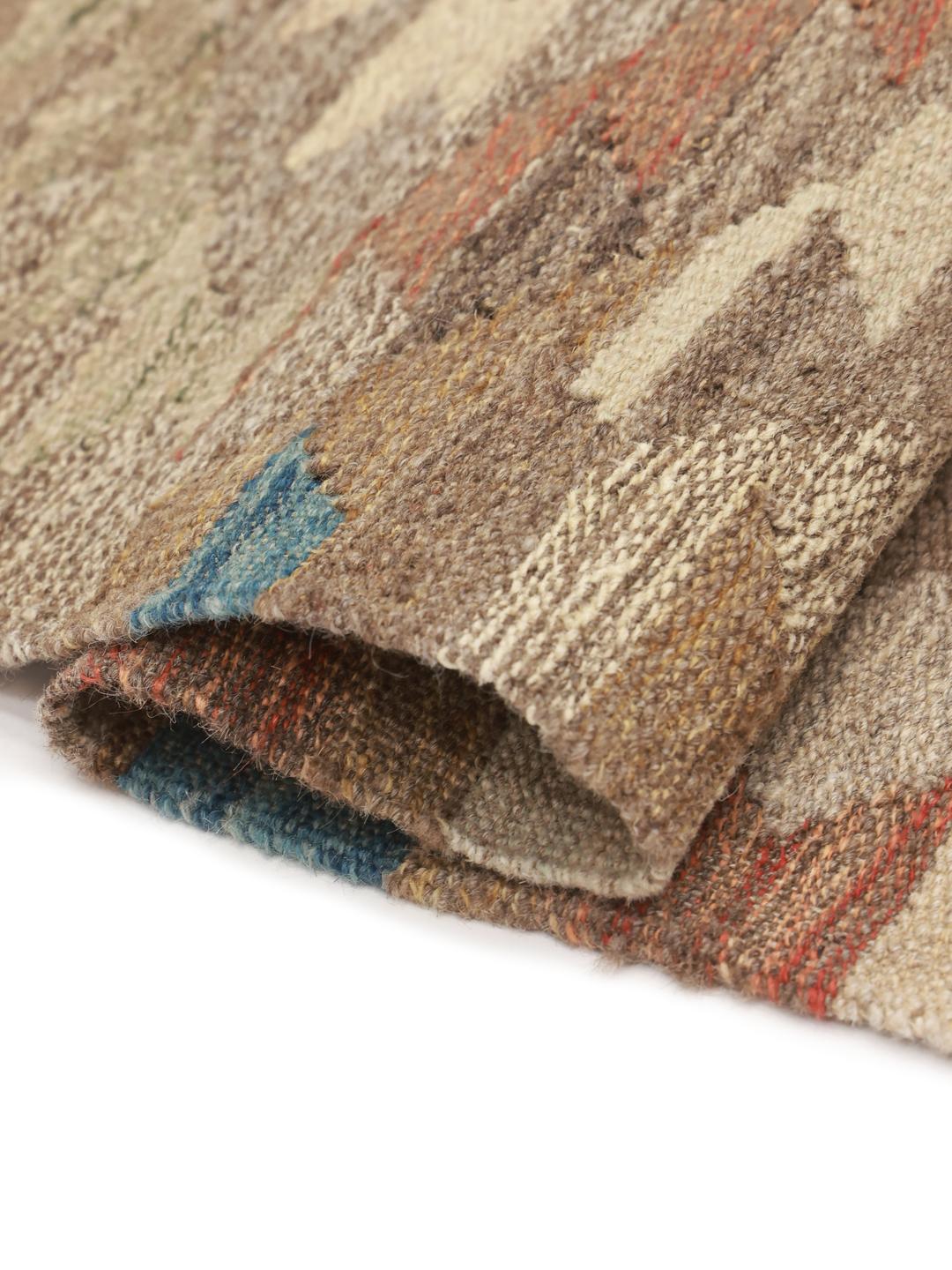Hand-woven Afghan runner with geometric patterns in beige and earthy tones