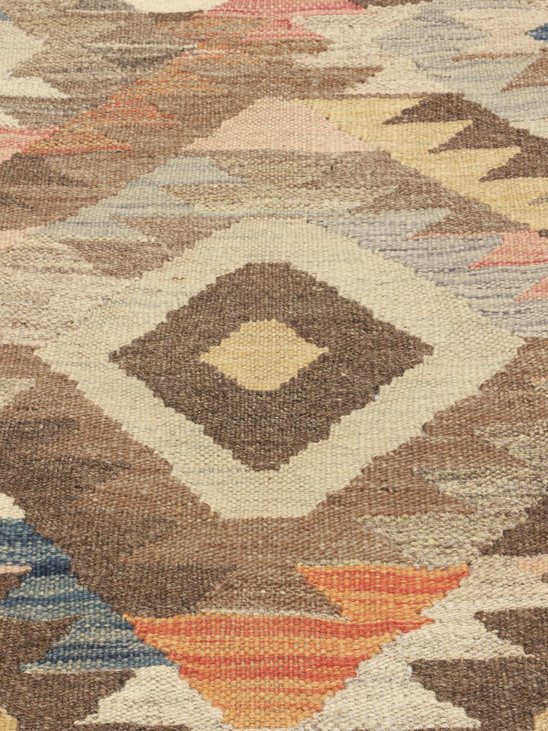 Hand-woven Middle Eastern runner with geometric patterns in beige and multicolour
