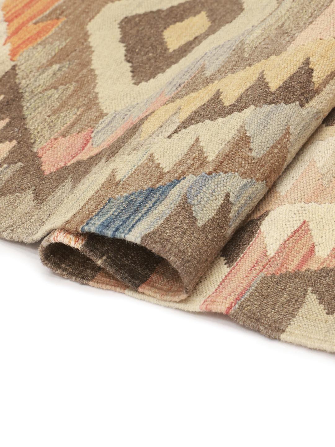 Hand-woven Middle Eastern runner with geometric patterns in beige and multicolour