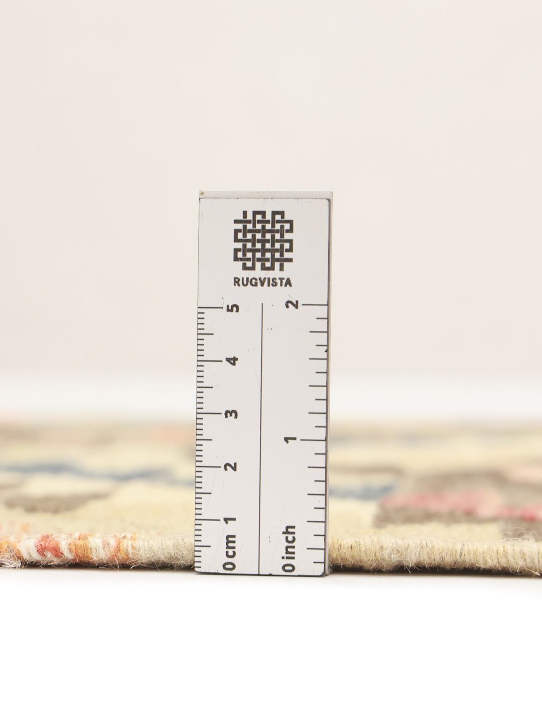 Hand-woven Middle Eastern runner with geometric patterns in beige and multicolour